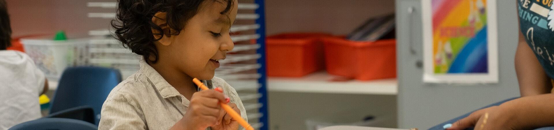 A student paints during art class.